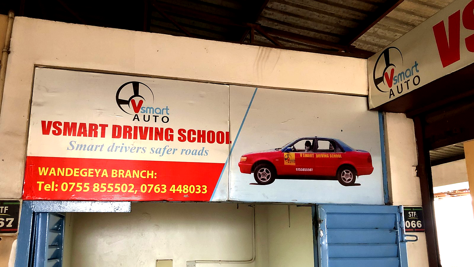 VSMART office signage at Wandegeya Market